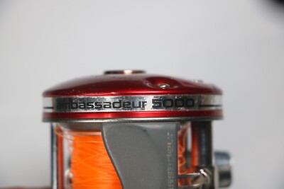 Vintage Abu Ambassadeur 5000 Red 4 Screw Fishing Reel for sale