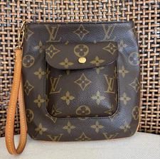 Louis Vuitton Authentic Monogram Partition Pouch Wristlet
