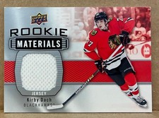 2019-20 Kirby Dach Upper Deck Rookie Material Jersey Card #RM-KD. rookie card picture