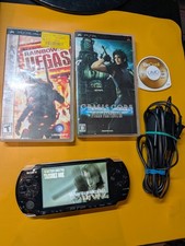 Sony PSP-3000 Playstation Portable System Console with Charger  2 Games 1 Movie