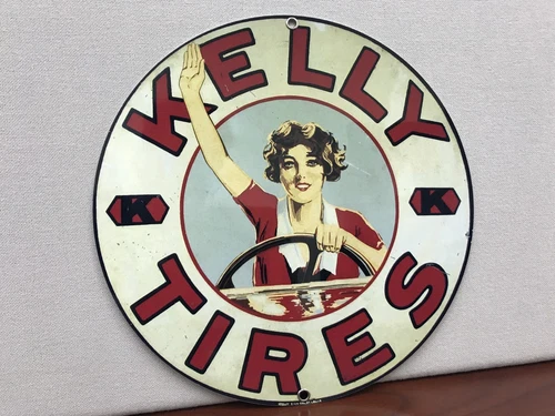 Kelly Tires round weathered garage vintage style round metal sign