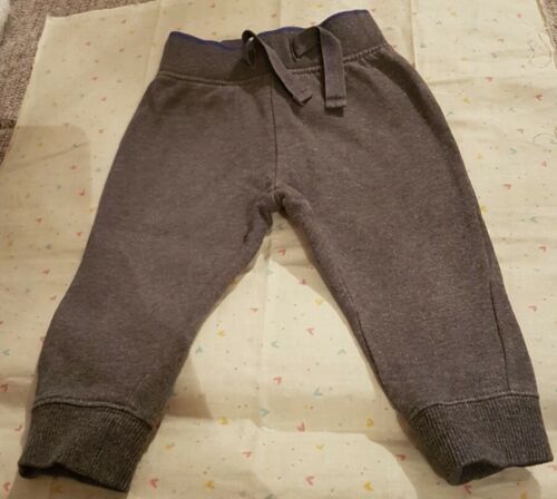 Pantalones bajos para correr Mini Club 6-9 meses bebés niños grises cintura elástica - Imagen 1 de 2