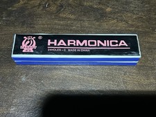 Vintage Parrot tremolo harmonica 24Holes-C inside its original cardboard box