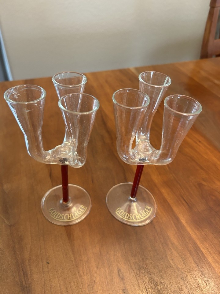 A rare triple-flute Goldschläger cordial shot glass with a red stem — a niche piece of 90s barware nostalgia that whisky collectors will flip over.