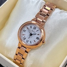CITIZEN xC Happy Flight ES9002-58A Eco-Drive Radio Controlled Gold Tone Watch
