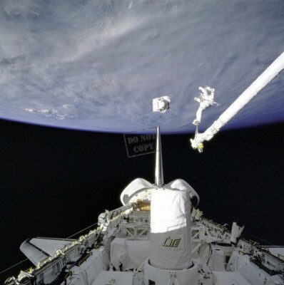 Astronauts Carl J. Meade and Mark C. Lee (SAFER) test EVA Spacewalks 12X12 PHOTO