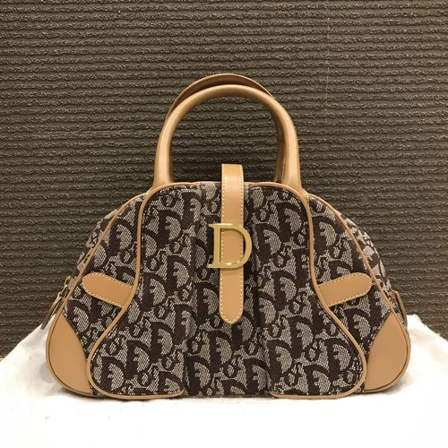 CHRISTIAN DIOR Sac à main double selle trotteur toile cuir marron beige