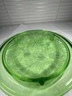 Uranium green depression glass 3 footed cake plate by Jeanette Sunflower pattern