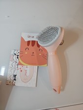 Cat Hair Brush, Soft Silicone Self Cleaning Brush for Short and Long Hair.. Open