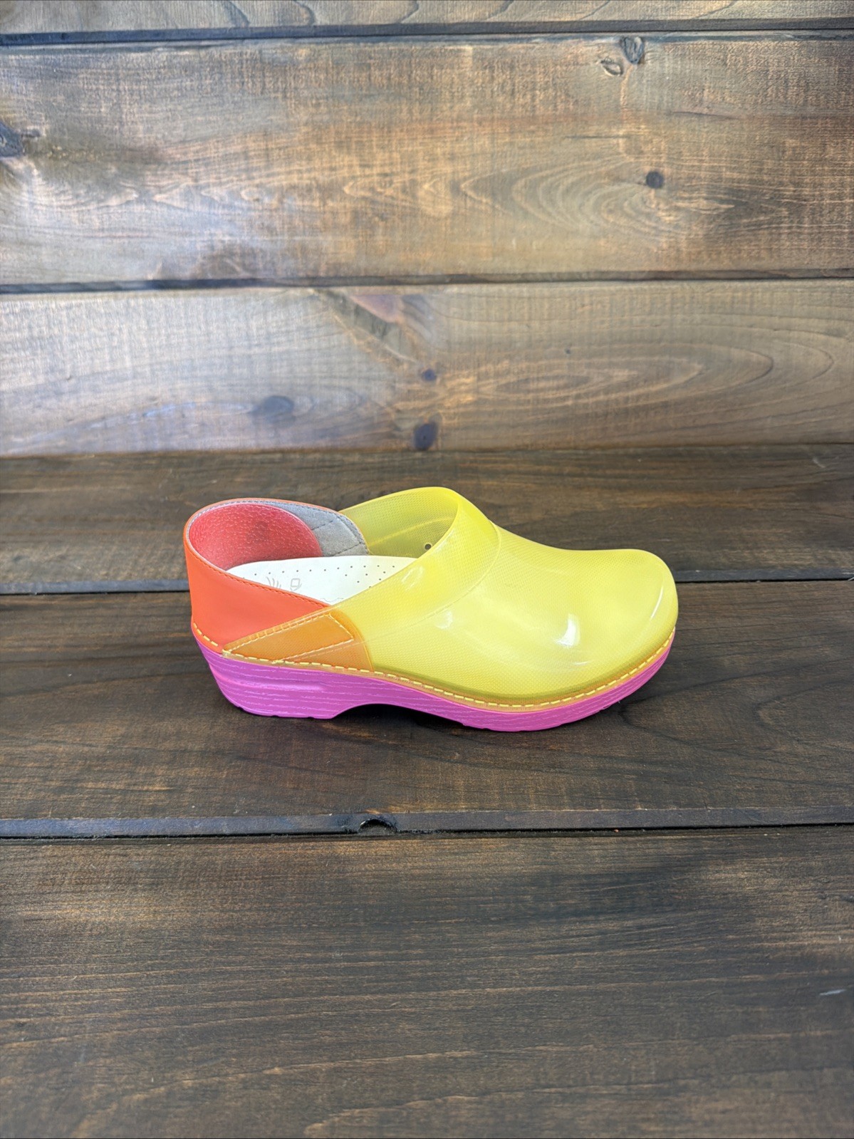 Dansko Professional Translucent Nursing Clogs in … - image 1
