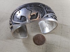 Wide VINTAGE Hopi silver overlay buffalo bracelet by CHALMERS DAY