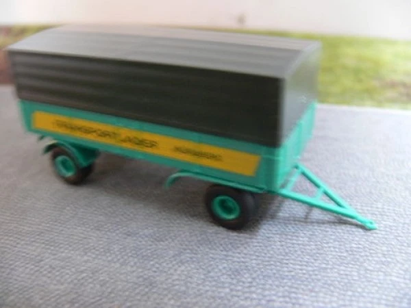 1/87 Brekina Anhänger Transportlader Nürnberg mit Plane 55254 - Bild 1 von 1