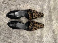 Stuart Weitzman Dorsetpipe Women's black pumps with jaguar Pony print accents: