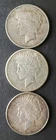 1922, 1922 S, and 1923 D $1 Peace Silver Dollars