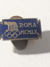 Piccola Spilla Distintivo CONI Olimpiadi di Roma  1960 in smalto blu  2 X 1 cm.