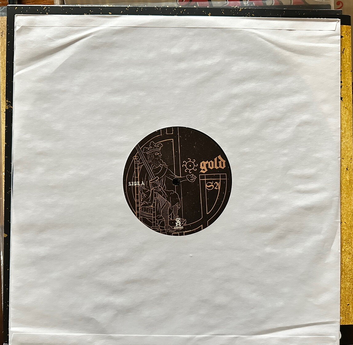 Muggs X Rigz - Gold - Gold Flake Edition 12” Black On White