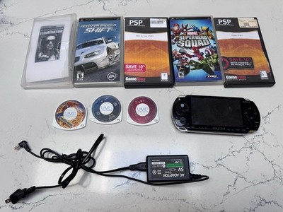 Sony PSP-1001 PlayStation Portable - Black With 8 Discs And Power Cord