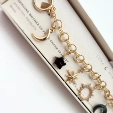 Luna Norte Charm Bracelet Celestial Sun Moon Star Gold Tone Toggle Clasp