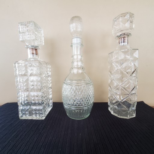 Assortment of Vintage Diamond Cut Crystal Whiskey Decanters