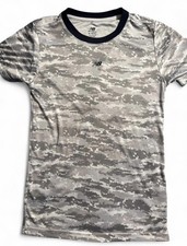 Youth Size XL New Balance Loose Dri Fit Short sleeve Shirt. Excellent condition.