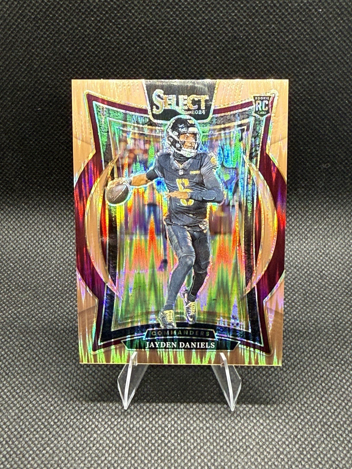 2024 Panini Select Concourse Jayden Daniels #26 Copper Shock Prizm /299 (RC)