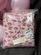 Kate Quinn pink Mushroom Quilt