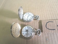 Two modern decorative quartz pocket watches--Hong Kong Japan Movt