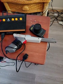 Atari flashback 7 classic game console Tested/ With Nes light Gun as-is Overall 