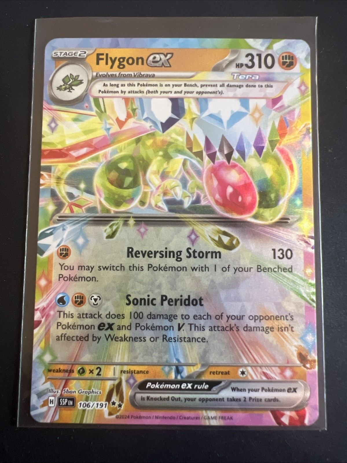 Pokémon Flygon ex 106/191 Sv08: Surging Sparks Holo NM
