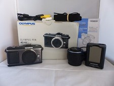Olympus PEN E-P2 12.3MP Digital Camera - Black Kit w/ 14-42mm Lens . Works good