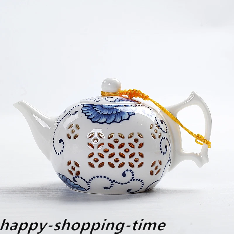 Tetera de porcelana esmalte fino diseño hueco tetera de kungfu con infusor nueva Foto 2 de 4