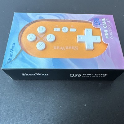 ShanWan Q36 Mini Wireless PC Game Controller - Orange/White Plastic, 1 Player