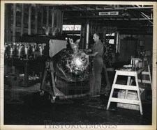 1956 Press Photo Mr. Paul Bergman works on Air News Plane in Engine Shop