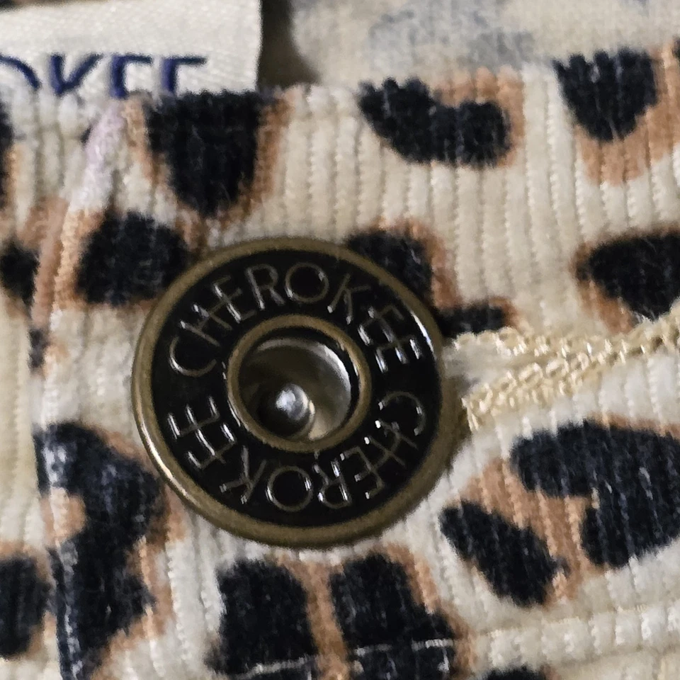 Pantalones de mezclilla elásticos Cherokee para niña estampado de leopardo cintura ajustable talla 10 Foto 4 de 4