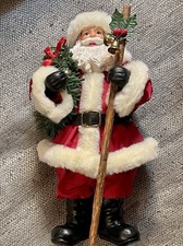 11” Santa figure with wreath & Holly Rod