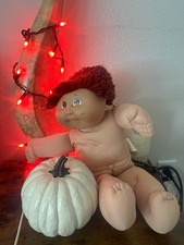 Vinyl Baby Doll Light Complexion Blue Eyes Red Curly Hair Gender Neutral cabish