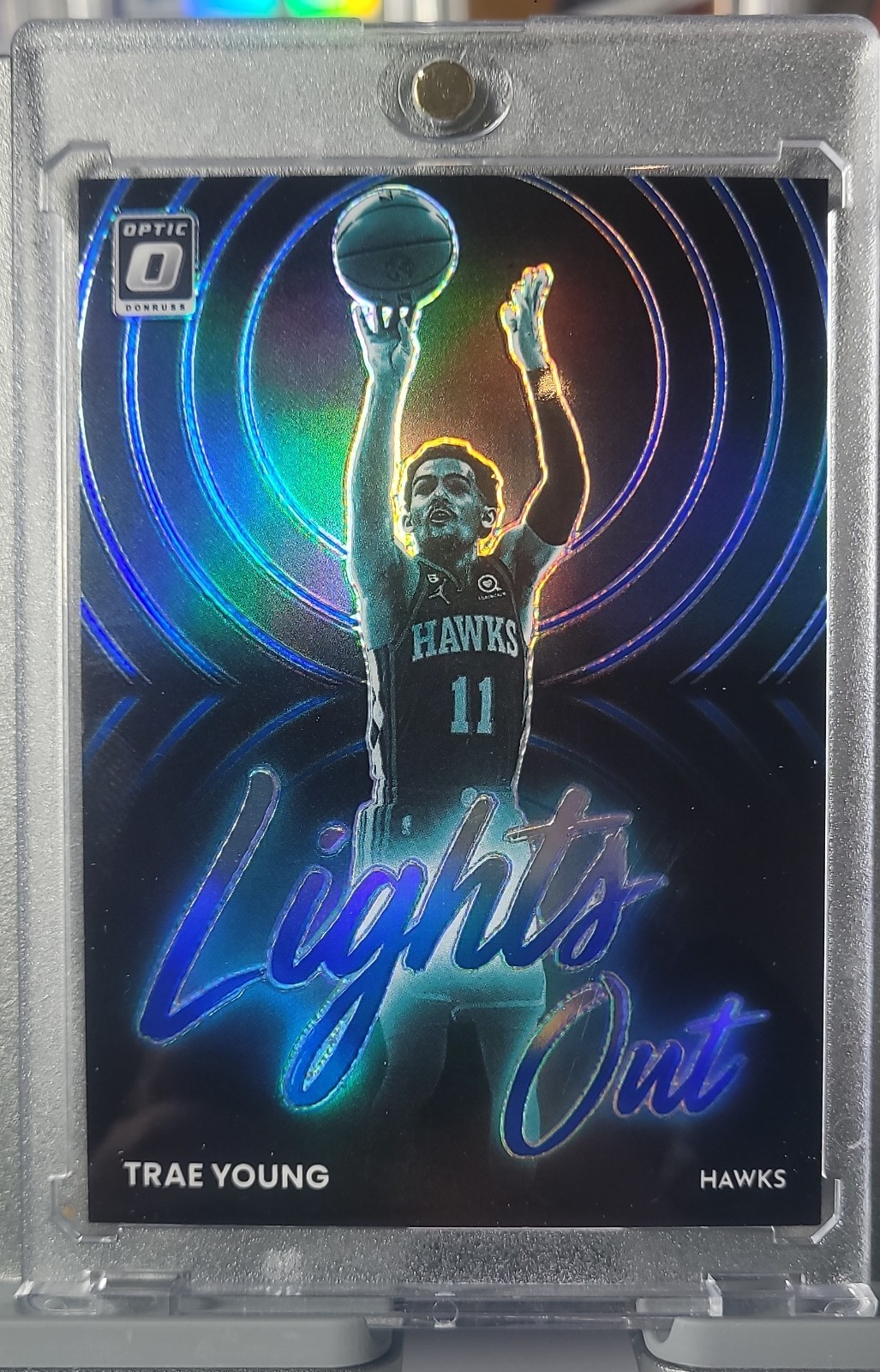 2022-23 Panini Donruss Optic - Lights Out Trae Young #8 Blue Prizm /49