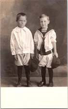 RPPC Postcard Two Boys in Sailor & Tunic Outfits AZO Stamp Box c.1915