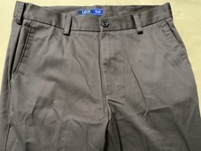 NWOT IZOD KHAKI FLAT FRONT PANTS 32X30 RETAILS  70