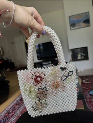Handmade pearl bag with beaded flowers