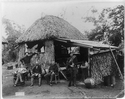 Photo:[Five American soldiers in front of thatched hut, Philippines]