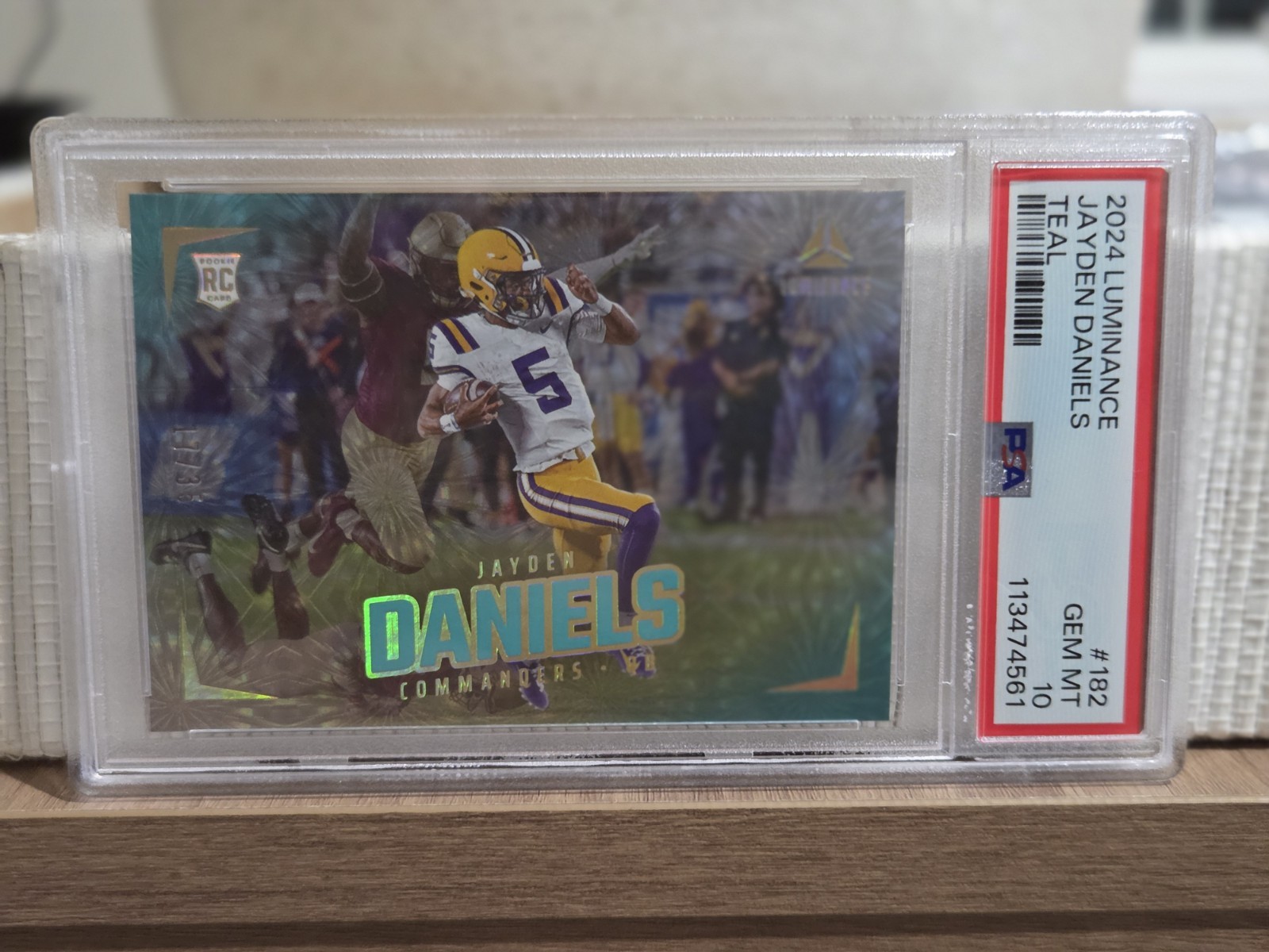2024 Panini Luminance - Rookies Jayden Daniels #182 Teal /35 (RC) PSA 10