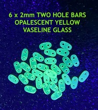25 sztuk 6 x 2mm Dwuotworowe pręty OPALIZUJĄCE Żółte WAZELINE / URAN SZKLANE Koraliki