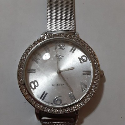 Never worn silver tone wide face watch mesh band 9'' needs new battery