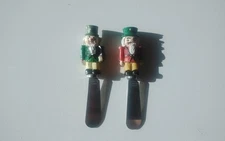 Lot of 2 Christmas Butter Cheese Knives Spreaders Two Nutcrackers Green Red