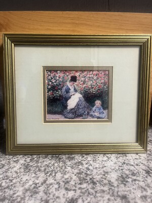 Claude Monet Camille Monet And A Child In The Artist's Garden In Argenteuil