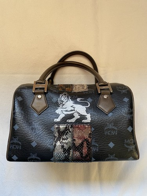 #ad MCM Black Leather Boston Bag with Lion Motif and Mixed Snake Print Accents $480.00