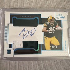 2020 Panini One - Rookie Dual Patch Autographs AJ Dillon #49 Blue /99 (AU, MEM,