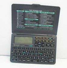 Sharp EL-6520 Electronic Organizer 11KB Calculator PDA - for parts,not working 