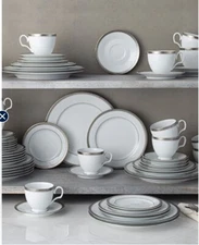 settings valued at 400. 65 for dinner, salad and bread plates, tea cup & saucer.